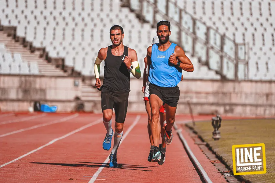 Three athletes were competing in a race on a precisely marked running track. Three Athletes on a Running Track